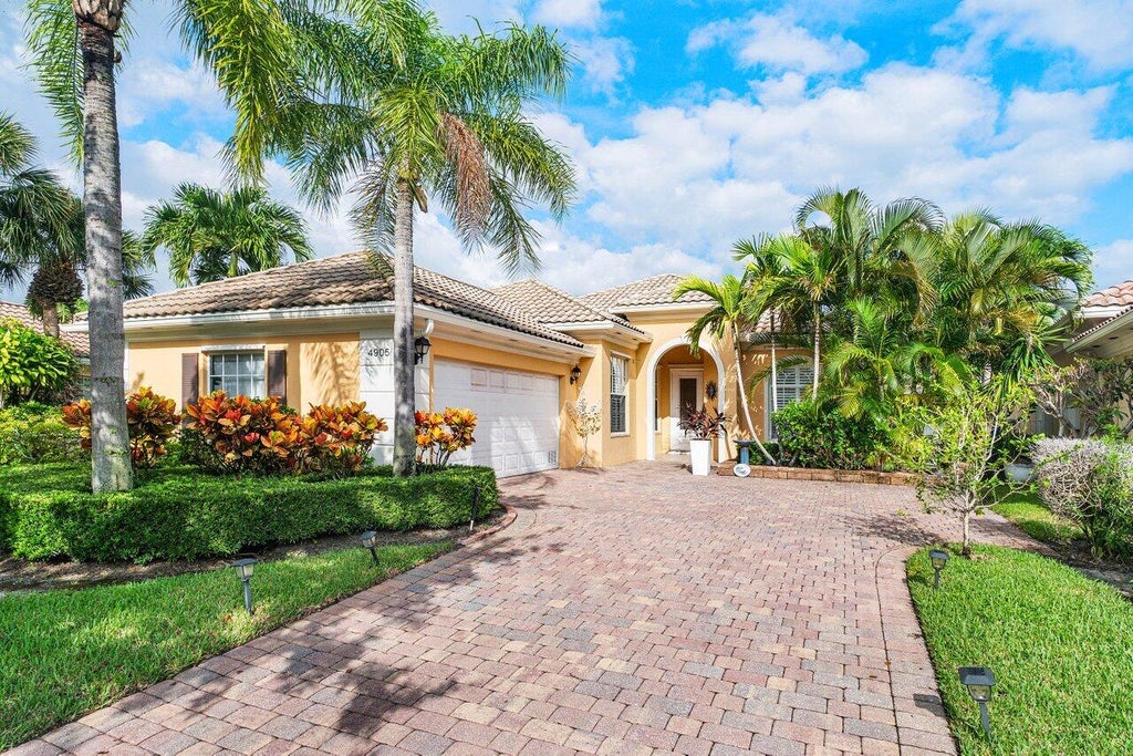 Photo of 4905 Grassleaf Dr, Palm Beach Gardens, FL 33418 (MLS # R11018768)
