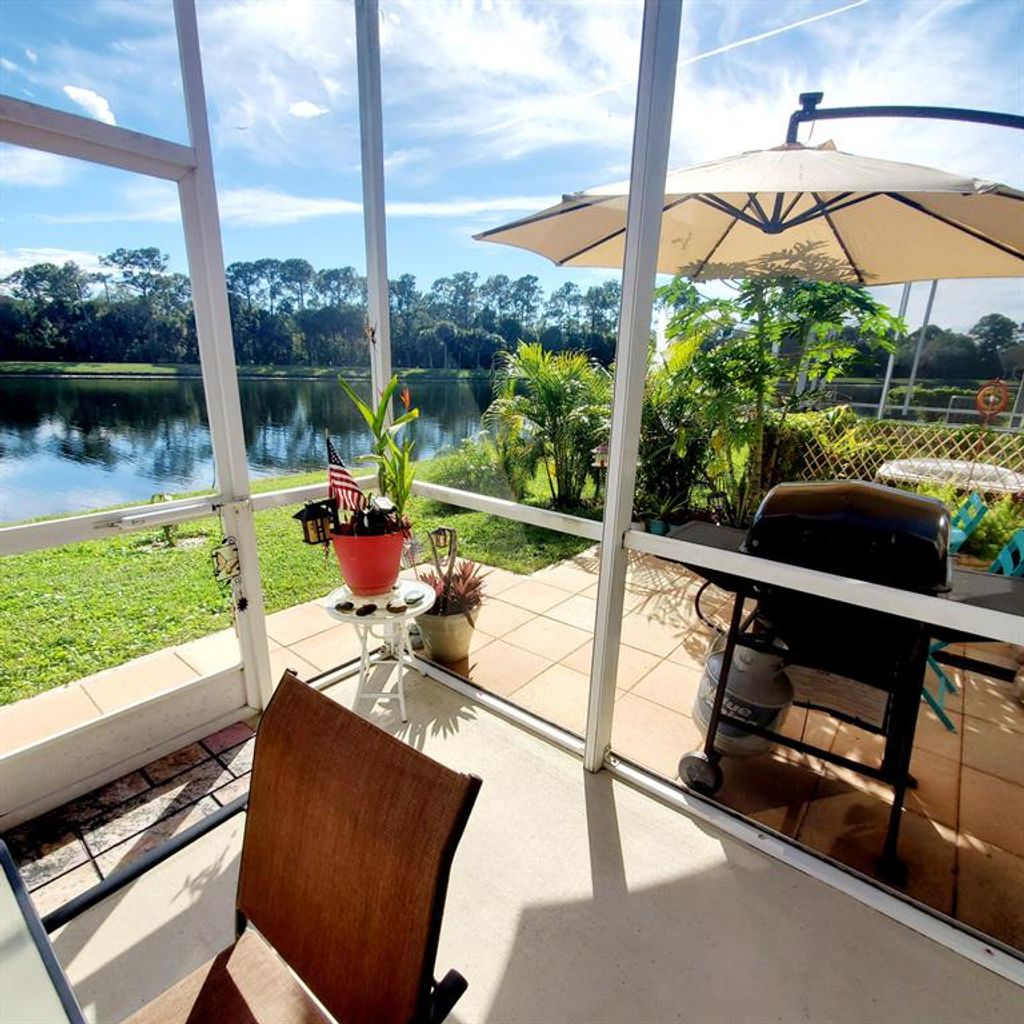Photo of 8538 Water Cay, West Palm Beach, FL 33411 (MLS # R10757974)