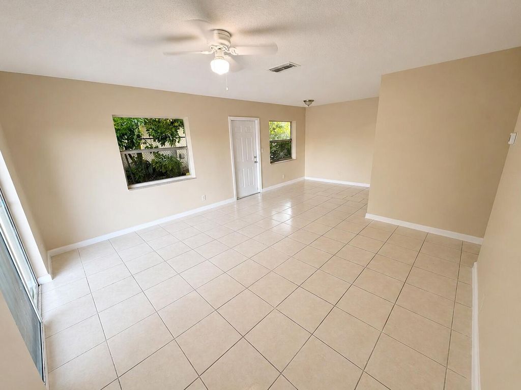 Photo of 4151 NW 30th Terrace #4, Lauderdale Lakes, FL 33309 (MLS # B26022267)