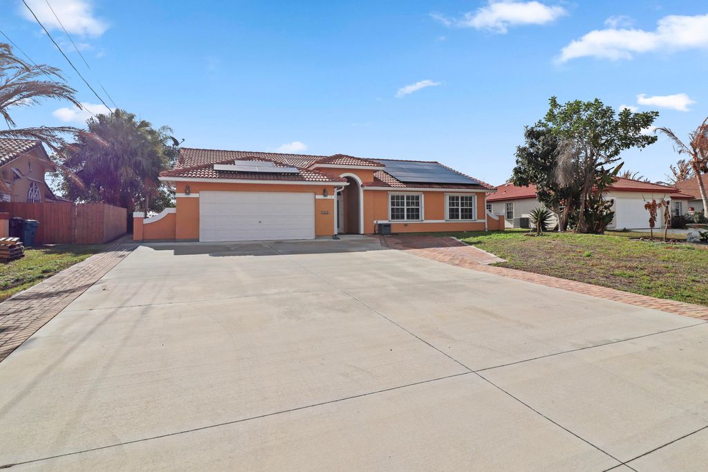 Photo of 152 NE Twylite Terrace, Port Saint Lucie, FL 34983 (MLS # B26003543)