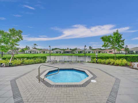 Tiny photo for 8334 W Blue Spring Drive #8334, Parkland, FL 33067 (MLS # B26028311)