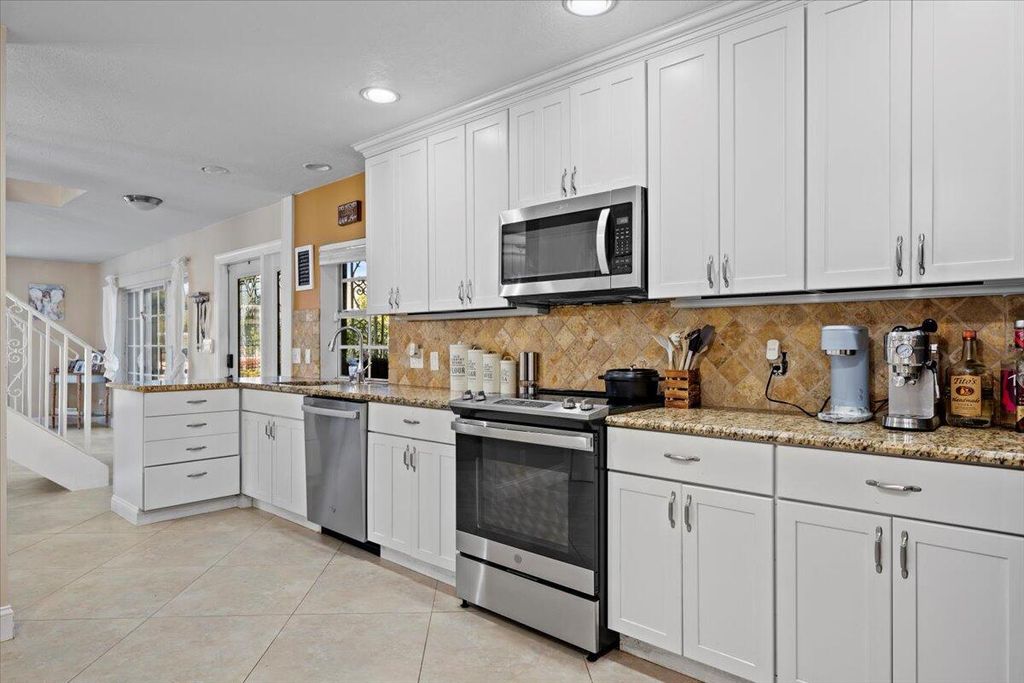 Photo of 1902 Vision Drive, Palm Beach Gardens, FL 33418 (MLS # R11053847)