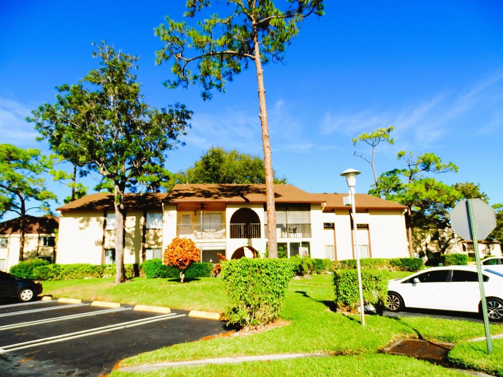 Photo of 409 Pine Glen Lane #A-2, Greenacres, FL 33463 (MLS # B26018476)