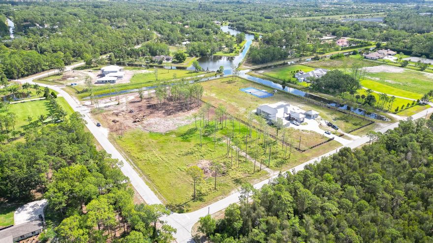Amazing and clear 5 acres lot in Homeland. Seller offers to buyer approved plans to build a house and a 6 stall barn . Close to turnpike, shopping and golf courses.15 miles of bridal paths to ride your horses . 2 miles from WEF, Polo and Global Venues. Come and live in Paradise.