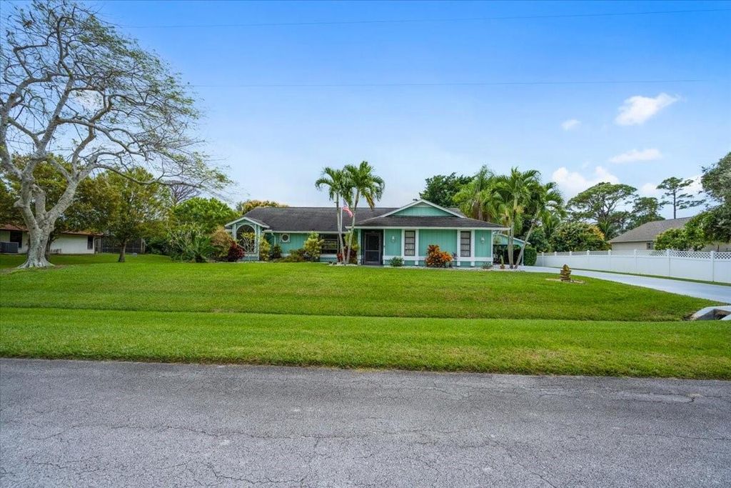 Photo of 1822 SE Beving Avenue, Port Saint Lucie, FL 34952 (MLS # R10769741)