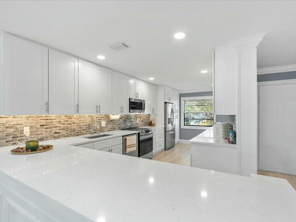 Photo of 36 Eastgate Drive #H, Boynton Beach, FL 33436 (MLS # R11151992)