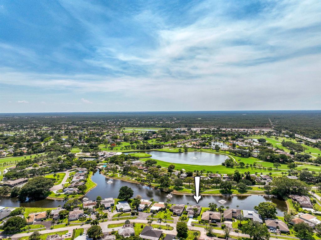 Photo of 13793 Whispering Lakes Lane, Palm Beach Gardens, FL 33418 (MLS # R11132959)