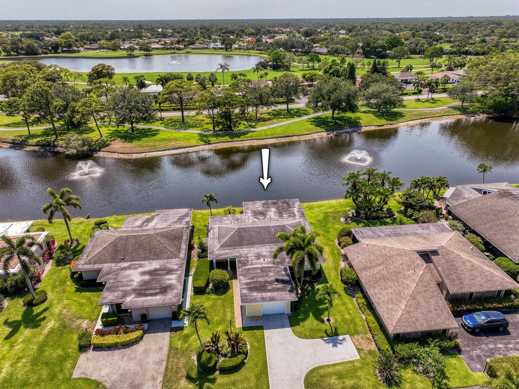 Photo of 13793 Whispering Lakes Lane, Palm Beach Gardens, FL 33418 (MLS # R11132959)