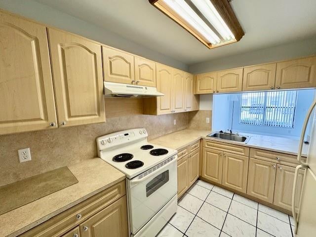 Photo of 10006 WINDING LAKE Road #101, Sunrise, FL 33351 (MLS # B26076361)