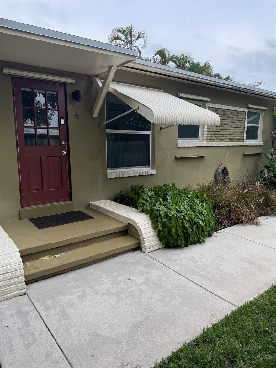 Clean, charming updated rear most unit on quiet street within walking distance of Publix and CVS. Gleaming wood floors, new modern kitchen, mini split A/C. 4 unit building fenced for privacy with lush gardens surrounding and lovely marine life mural.