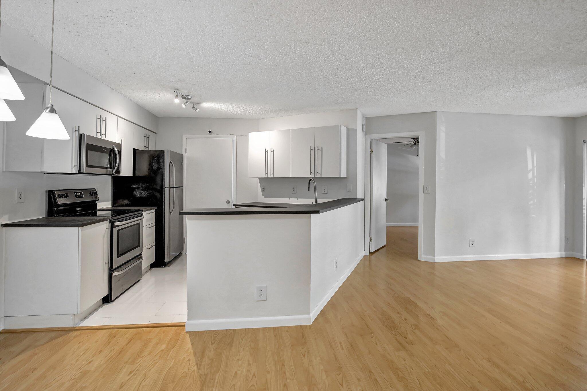 This beautifully updated second-floor condo features an open-layout kitchen with modern stainless steel appliances, 2 spacious bedrooms, and 2 bathrooms. Enjoy the convenience of an in-unit washer and dryer.Perfect for first-time homebuyers or investors, this property allows immediate renting after purchase. Located in the sought-after Summer Breeze community, you'll love the prime location close to Sawgrass Mills Mall and the easy access to major highways.