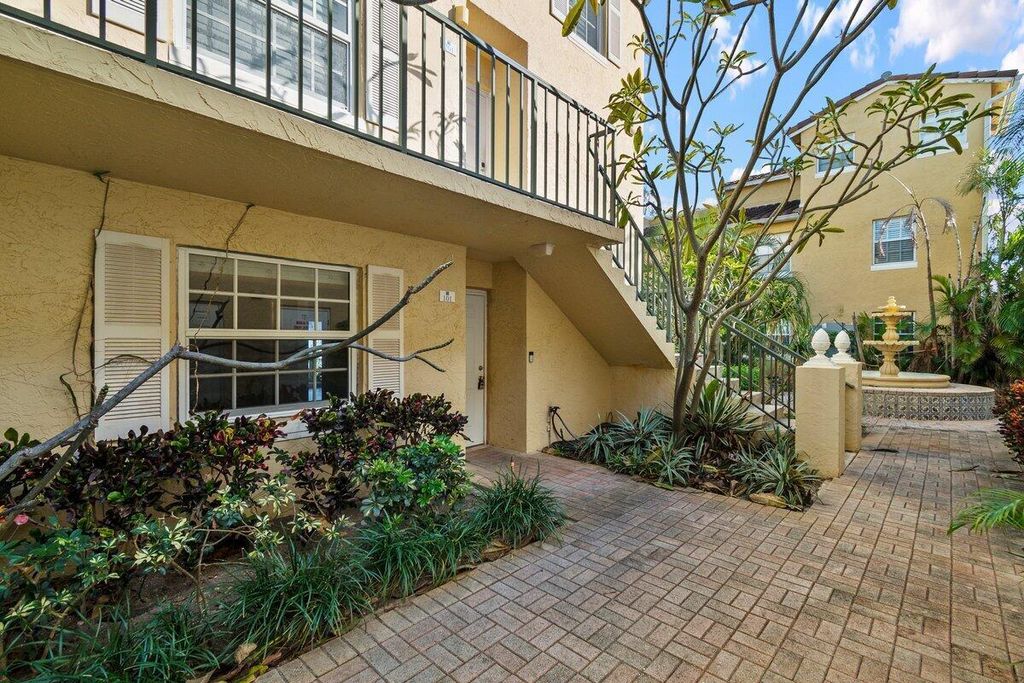 Photo of 1145 Lake Shore Drive #101, Lake Park, FL 33403 (MLS # R11051559)