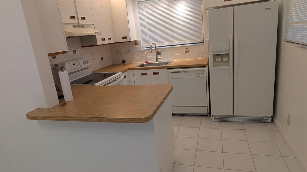 Photo of 2372 NW 39th Avenue, Coconut Creek, FL 33066 (MLS # F10551694)