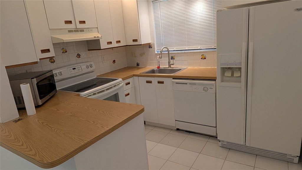 Photo of 2372 NW 39th Avenue, Coconut Creek, FL 33066 (MLS # F10551694)