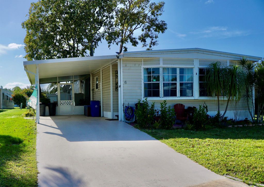 Photo of 6 SE Merida Lane, Port Saint Lucie, FL 34952 (MLS # R10970950)