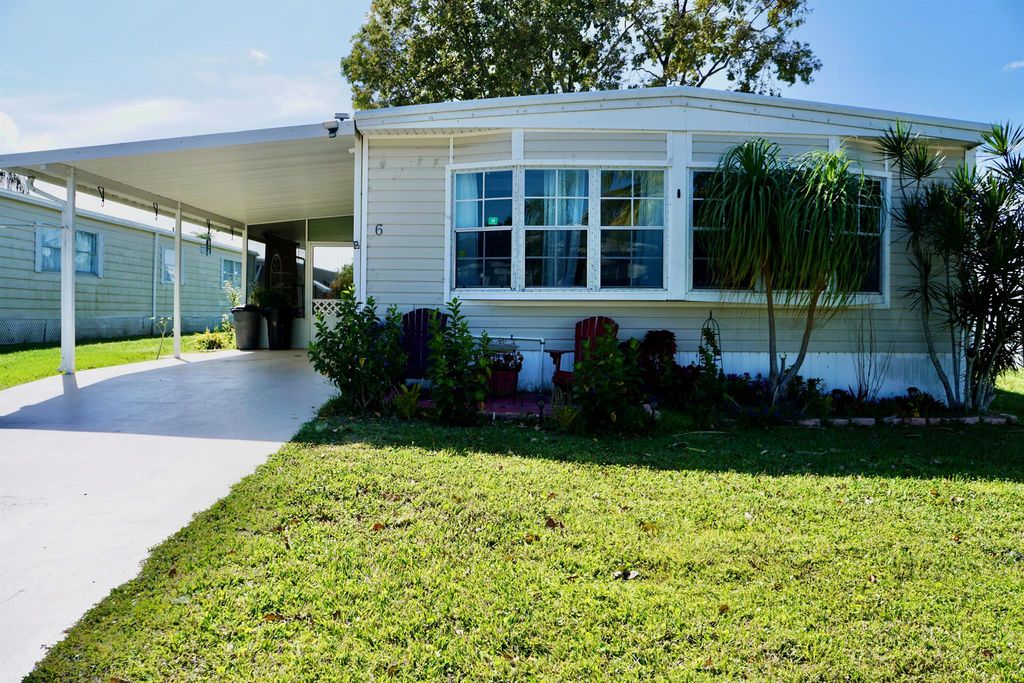 Photo of 6 SE Merida Lane, Port Saint Lucie, FL 34952 (MLS # R10970950)