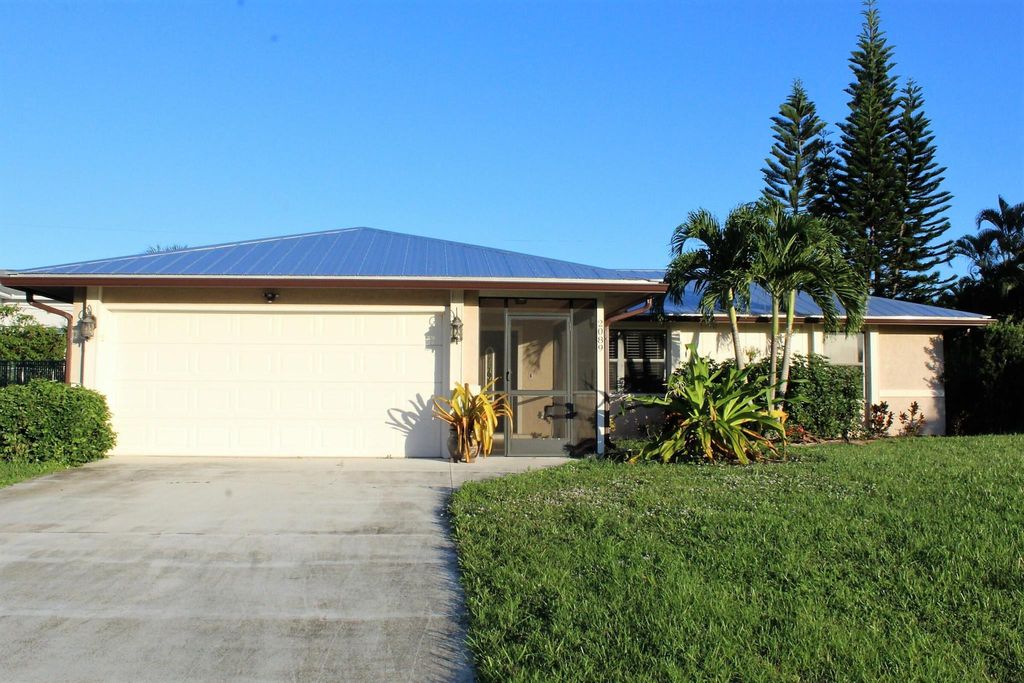 Photo of 2089 SW Aguero Street, Port St Lucie, FL 34953 (MLS # R10917830)