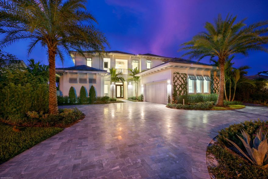 This newly constructed Contemporary British West Indies beauty is located in prestigious Admirals Cove and is filled with modern flair and luxury finishes throughout. This 5BR/6.5Bth home is located close to the Club at the end of a cul-de-sac and offers wide/panoramic water views. Enter through a dramatic foyer and behold the stunning water views surrounding the great room with floor-to-ceiling linear gas fireplace, custom bar w/ wine-cooler and pocket sliding doors open to the patio/pool area. The chef's kitchen is a stunning place to gather and comes equipped with custom cabinetry, quartz countertops, two large prep islands, a Miele appliance center (including dual ovens, microwave & coffee station), Wolf six-burner gas cooktop w/ vent, Scotsman Ice-Maker and 48'' Sub-Zero Refrigerator/ Freezer. A luxury chandelier hangs from a designer wood-beam ceiling and dazzles your guest in the waterfront dining room. The first floor master suite offers dramatic his & hers master bathrooms w/ electric Toto toilets, custom cloud ceiling, enormous walk-in closets and large glass doors open to the patio/pool area. The stainless steel staircase w/ wood stain steps will take you to the second floor bridge leading to three large en suite bedrooms (One VIP suite w/ balcony), laundry room and morning bar. Additional interior features include 36"x36" Taj Mahal floors, designer fixtures, elevator, state of the art security system, icynene insulation, downstairs laundry room with washtub & plenty of cabinet space and hurricane windows and doors throughout.  The exterior features of the home offer a circular drive with gray natural stone, lush tropical landscaping, covered patio with summer kitchen, marble pavers, vanishing edge saltwater pool with heated spa, outdoor shower and a Azek composite sundeck & dock lead to your boat with some of the best water views in Admirals Cove.  This never before lived in home is the ideal home to entertain in, S. Florida style!!!