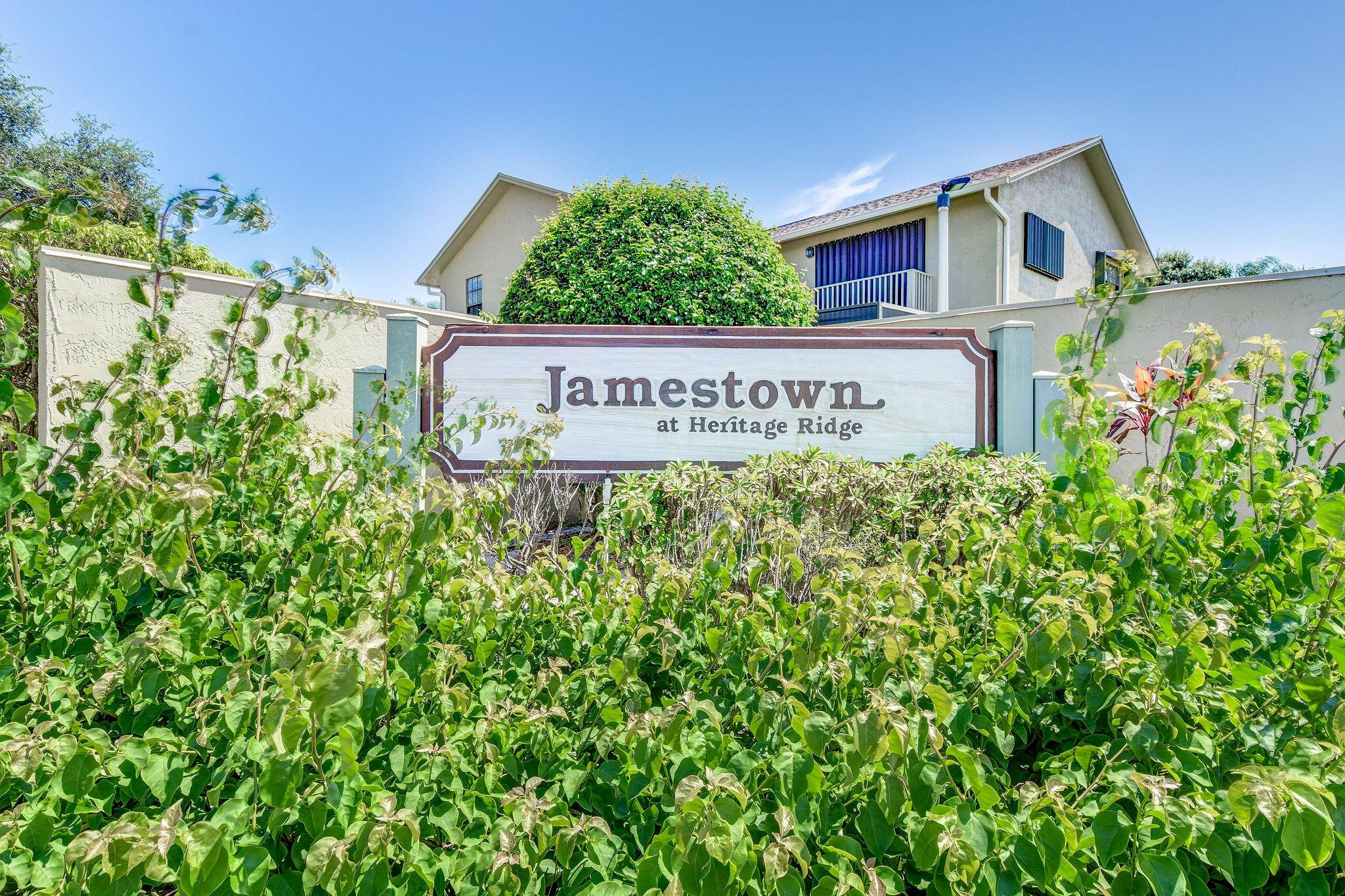 Charming and spacious 2-bedroom, 2-bathroom townhome located near the public golf course in Heritage Ridge at Jamestown, Hobe Sound. Just a 7-minute drive to the beautiful Hobe Sound Public Beach, fine dining and more. This townhome features a superior location within the community, just a few steps from the community pool. Enjoy ceramic tile flooring downstairs, new carpeting on the staircase, and stylish laminate flooring in the bedrooms. The living room and kitchen open to a large, fully enclosed patio with glass windows, offering a versatile bonus space that you can customize to your liking! The kitchen boasts beautiful granite countertops and stainless-steel appliances, while the bathrooms have been remodeled with granite vanity tops.