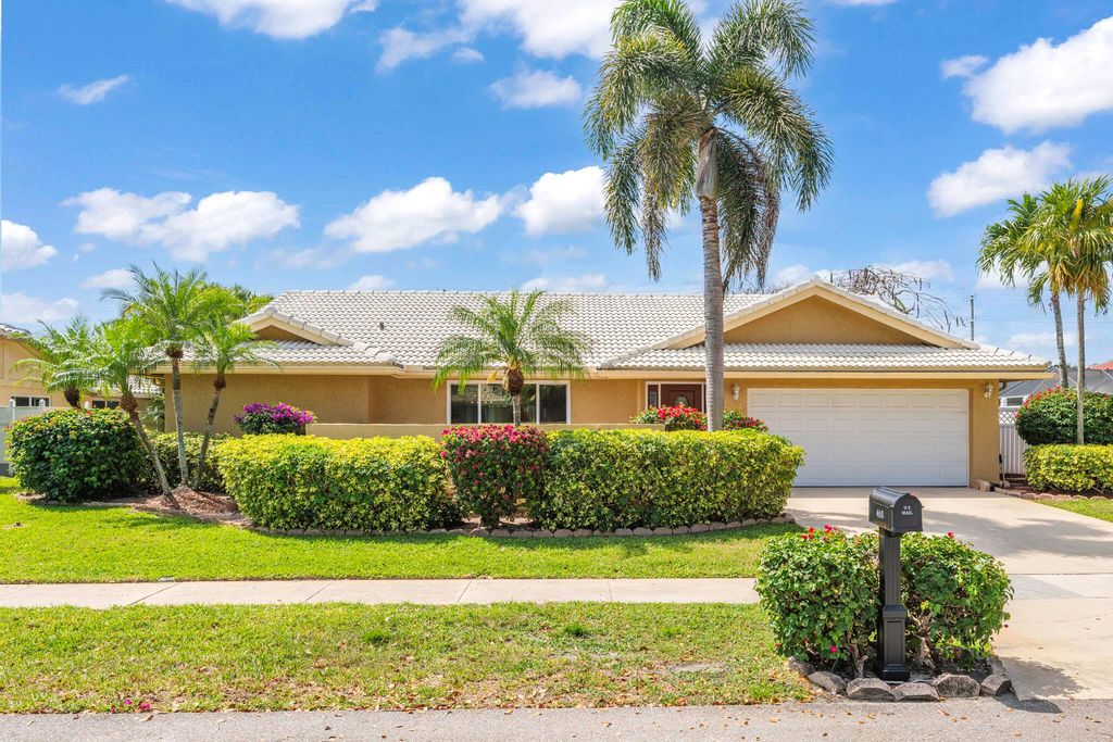 Photo of 460 NW 69th Street, Boca Raton, FL 33487 (MLS # R11082573)