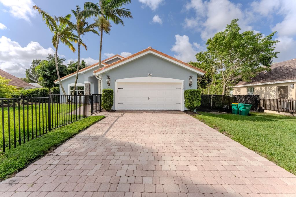 Photo of 11420 NW 26th Street, Plantation, FL 33323 (MLS # B26015119)