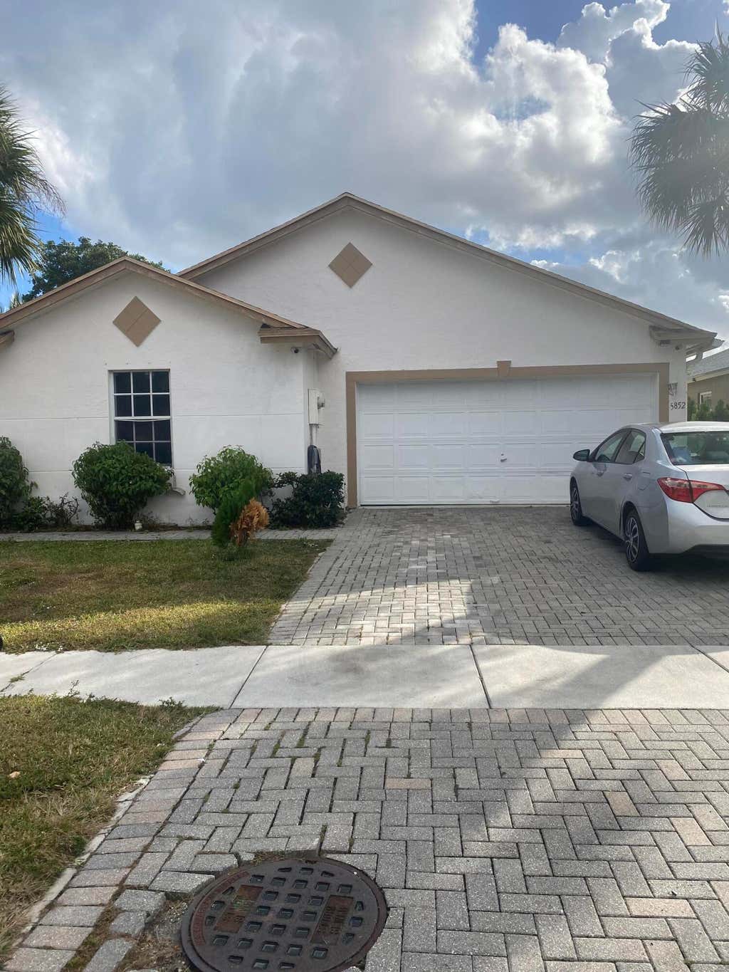 Photo of 5852 Azalea Circle, West Palm Beach, FL 33415 (MLS # R11048406)