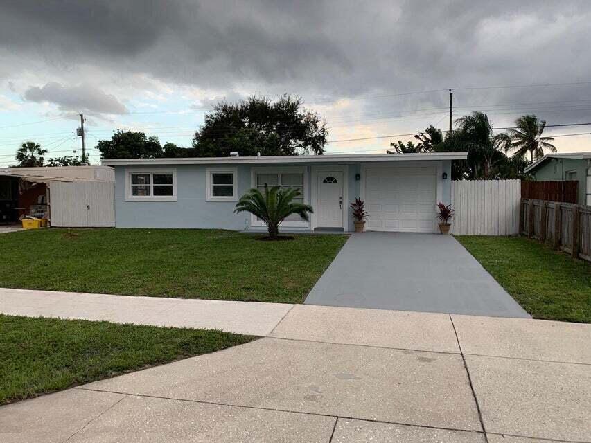 Photo of 5672 Purdy Lane, West Palm Beach, FL 33415 (MLS # B26063028)