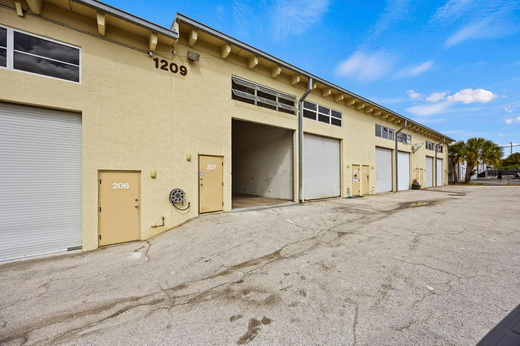 Photo of 1209 Gateway Road #207, Lake Park, FL 33403 (MLS # R11168405)