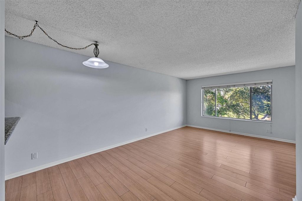 Photo of 906 Twin Lakes Drive #8-J, Coral Springs, FL 33071 (MLS # F10546624)