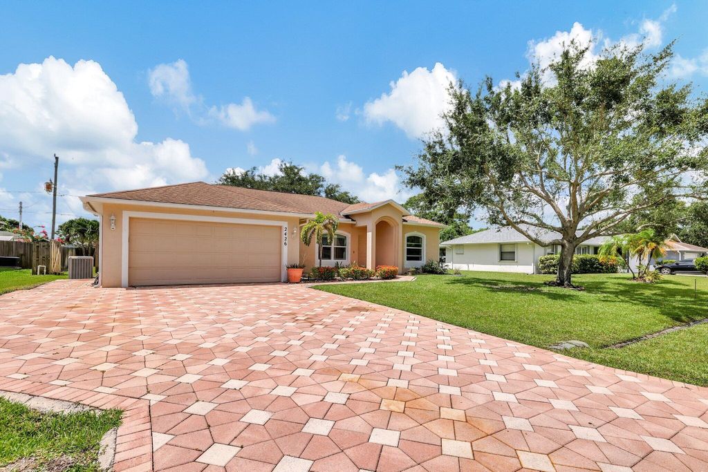 Photo of 2426 SE Betty Road, Port Saint Lucie, FL 34952 (MLS # R10996018)