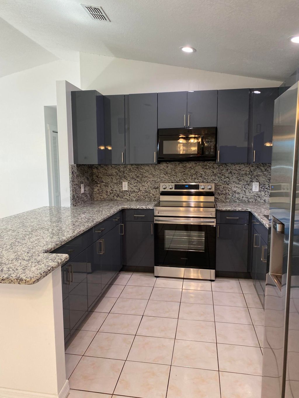 Photo of 757 NW Bayard Avenue, Port Saint Lucie, FL 34983 (MLS # R11141467)