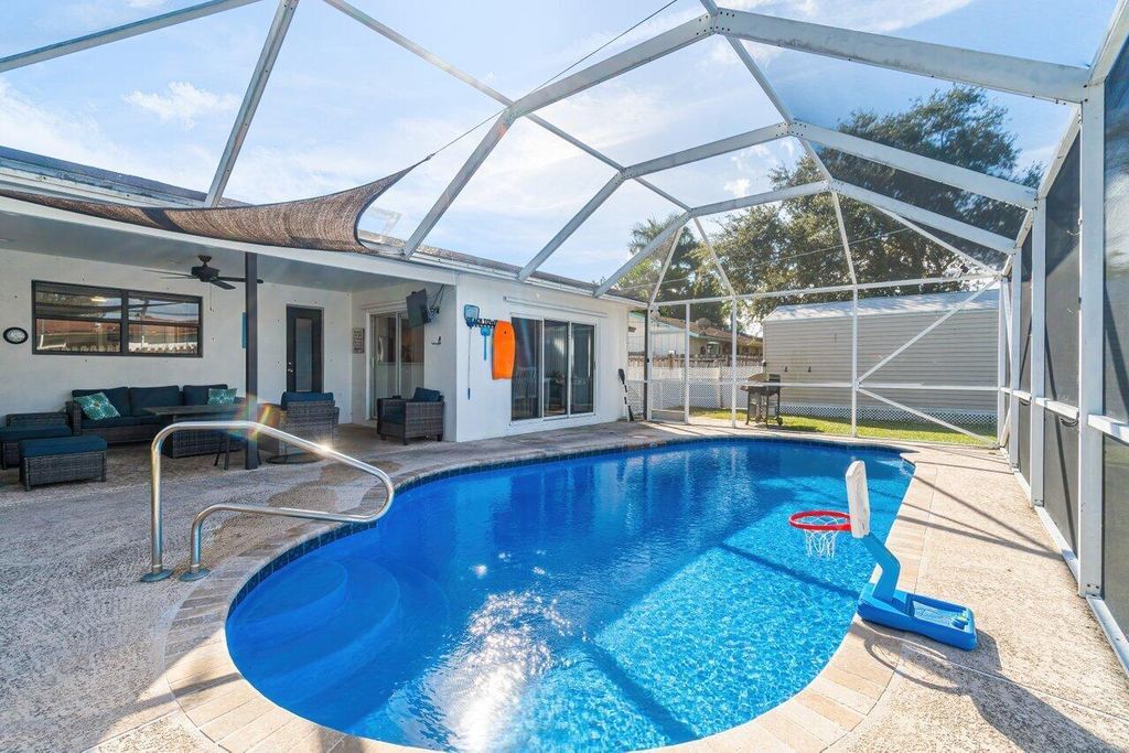 Photo of 3281 Amberjack Road, Lake Worth, FL 33462 (MLS # R10936107)