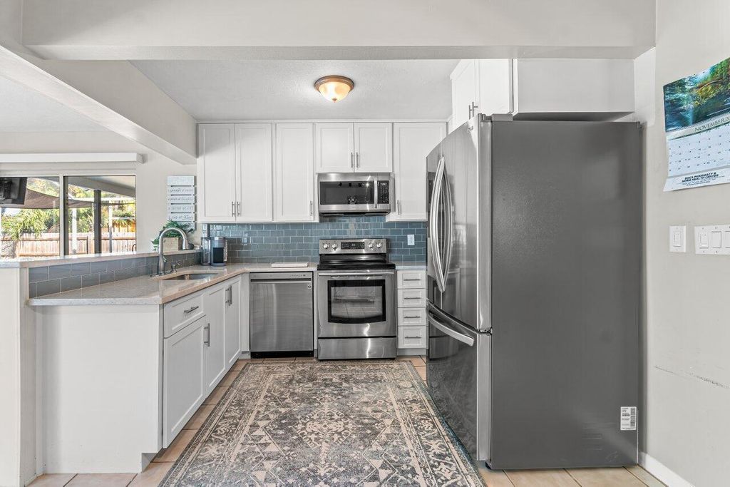 Photo of 3281 Amberjack Road, Lake Worth, FL 33462 (MLS # R10936107)