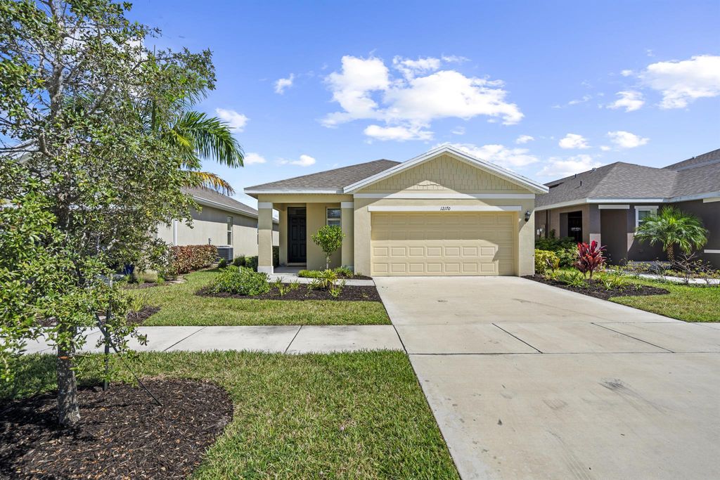 Photo of 12170 SW Rimini Way, Port Saint Lucie, FL 34987 (MLS # R11131615)