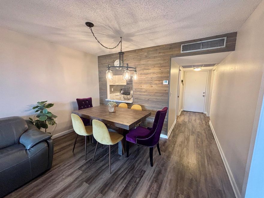 Welcome to this bright & spacious 1,100 sqft, 2/2 condo, featuring an updated kitchen with new appliances, vinyl flooring, and tons of natural light. Enjoy a screened patio with peaceful garden and water views, plus the convenience of elevators, laundry on every floor, a deeded parking spot right by the entrance, and plenty of guest parking. Residents have full access to Pine Island Ridge amenities including clubhouse, pool, fitness center, golf, tennis, pickleball, restaurants, and scenic walking trails, along with a private subdivision pool. Ideally located just minutes to I-595, Nova Southeastern University, shopping, and dining. Pet-friendly (up to 2 pets, dogs under 50 lbs). Unit is listed Partially furnished with the ability to remove any unwanted furniture.