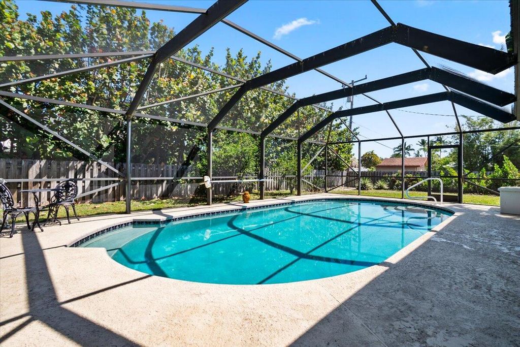 Photo of 8087 SE Coconut Street, Hobe Sound, FL 33455 (MLS # R11017495)