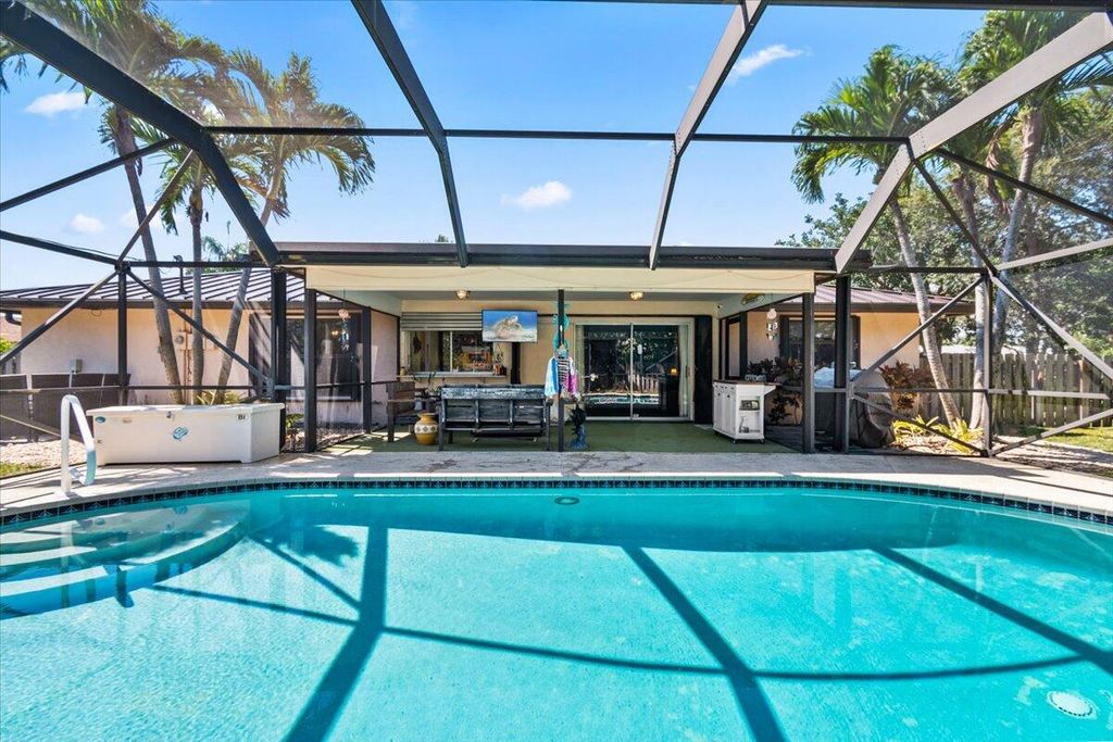 Photo of 8087 SE Coconut Street, Hobe Sound, FL 33455 (MLS # R11017495)