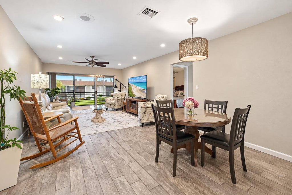 Photo of 755 Saturn Street #E203, Jupiter, FL 33477 (MLS # B26082627)