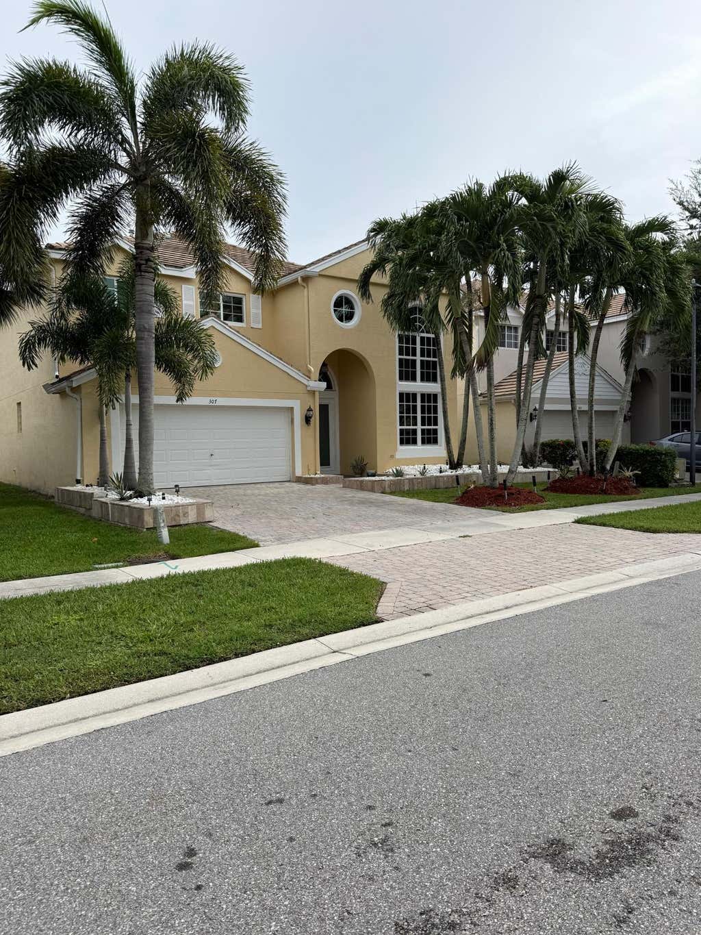 Photo of 307 BERENGER Walk, Royal Palm Beach, FL 33414 (MLS # B26060596)