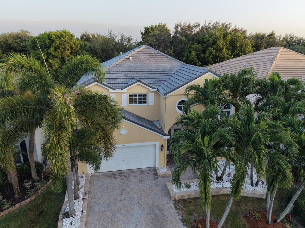 Photo of 307 BERENGER Walk, Royal Palm Beach, FL 33414 (MLS # B26060596)
