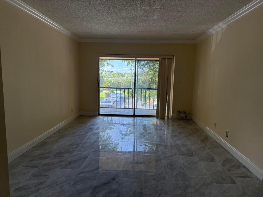 Beautiful, Clean 2BR/2BA Brand NEWLY RENOVATED Third floor unit with Brand NEW PORCELAIN TILE ALL OVER. . Newer Paint, Newer AC and Water Heater,. Open kitchen with snack counter. Large screened patio. NEW VANITIES IN THE BATHROOM.WASHER DRYER IN THE UNIT in 2nd bedroom. NEW COOKING RANGE AND DISHWASHER Walk to FAU and Boca Regional. Close to major roads like I-95, NEAR Boca Community Hospital and Town Center Mall and besides FAU. No pets or smoking allowed. Information is deemed to be reliable, but is not guaranteed.