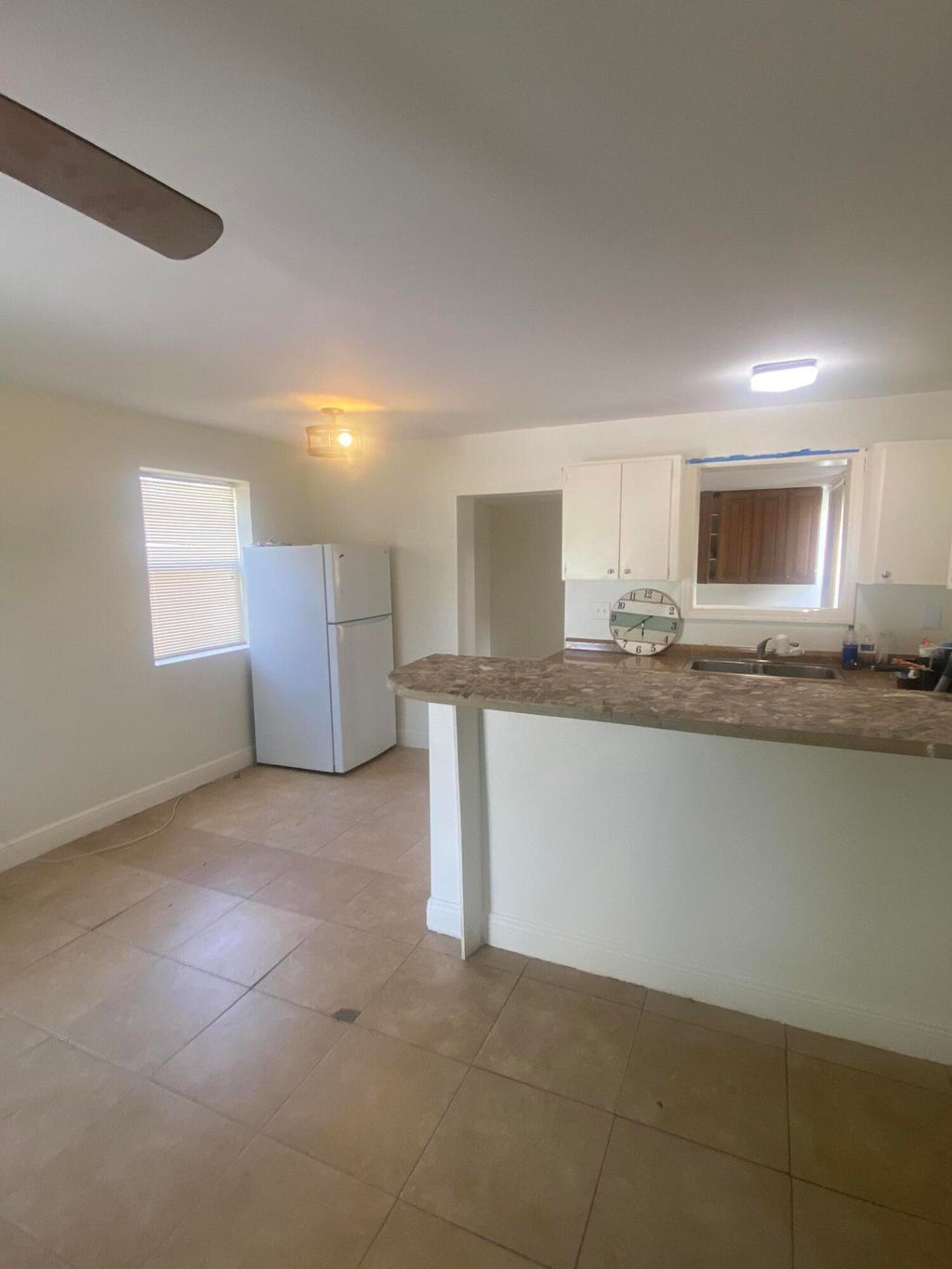 Photo of 3610 AVENUE F Avenue, Riviera Beach, FL 33404 (MLS # B26079378)