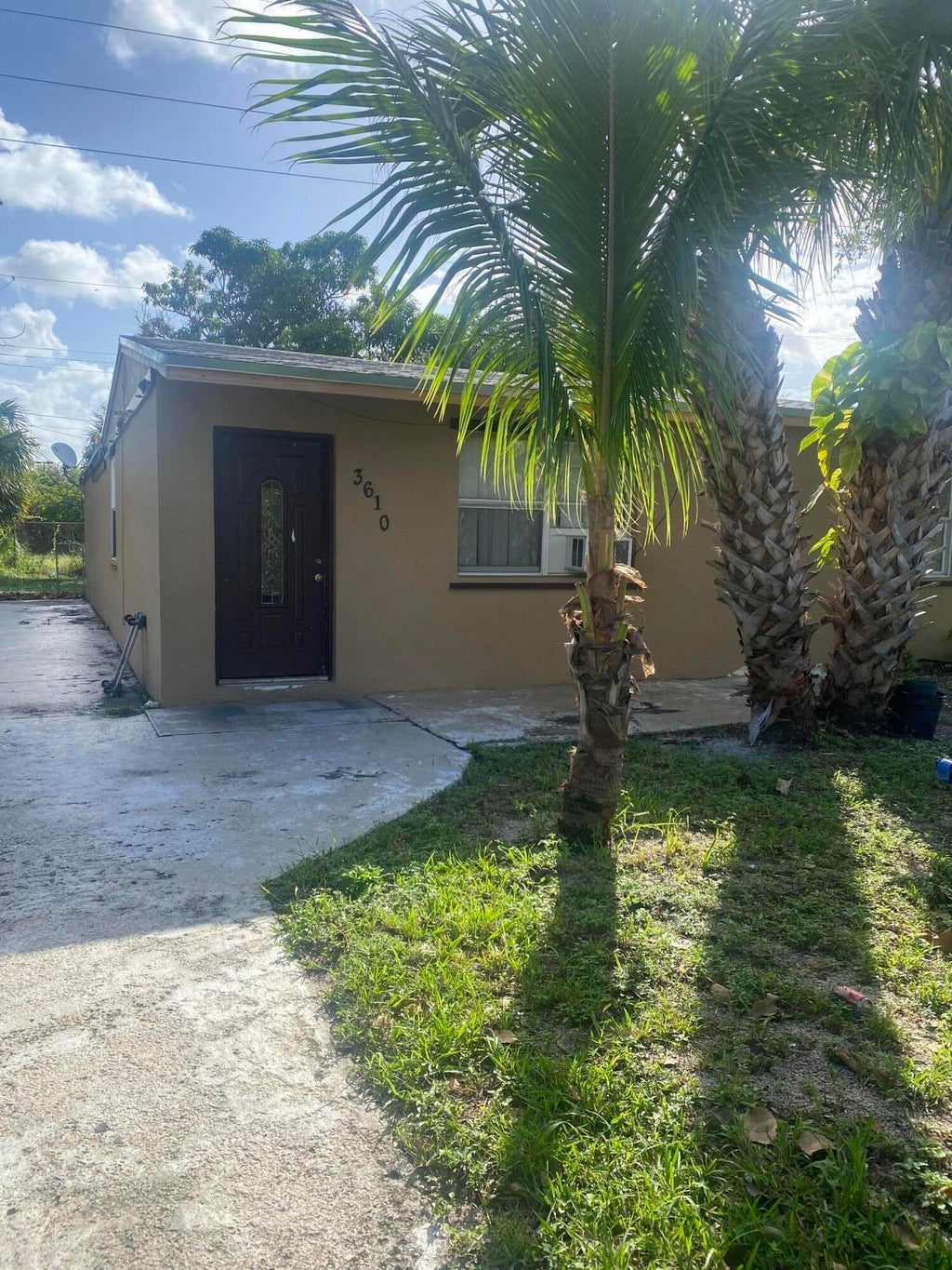 Photo of 3610 AVENUE F Avenue, Riviera Beach, FL 33404 (MLS # B26079378)
