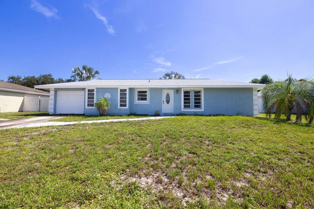 Photo of 1337 SE ROANOKE Street, Port Saint Lucie, FL 34952 (MLS # B26068584)