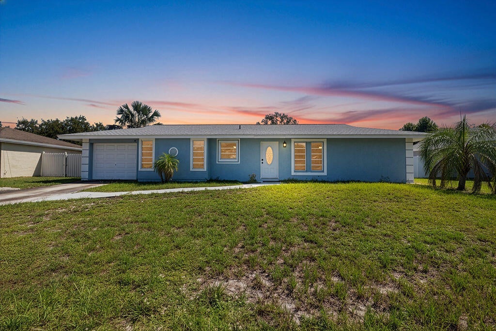 Photo of 1337 SE ROANOKE Street, Port Saint Lucie, FL 34952 (MLS # B26068584)