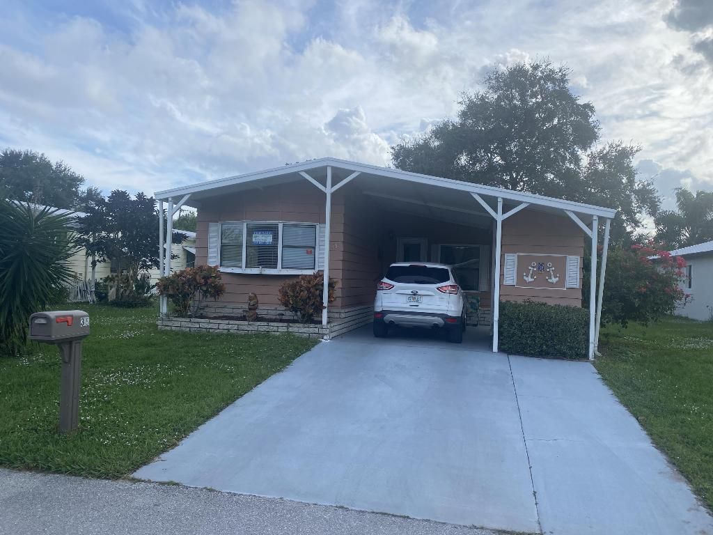 Photo of 38 Sierra Del Norte, Fort Pierce, FL 34951 (MLS # R10938172)
