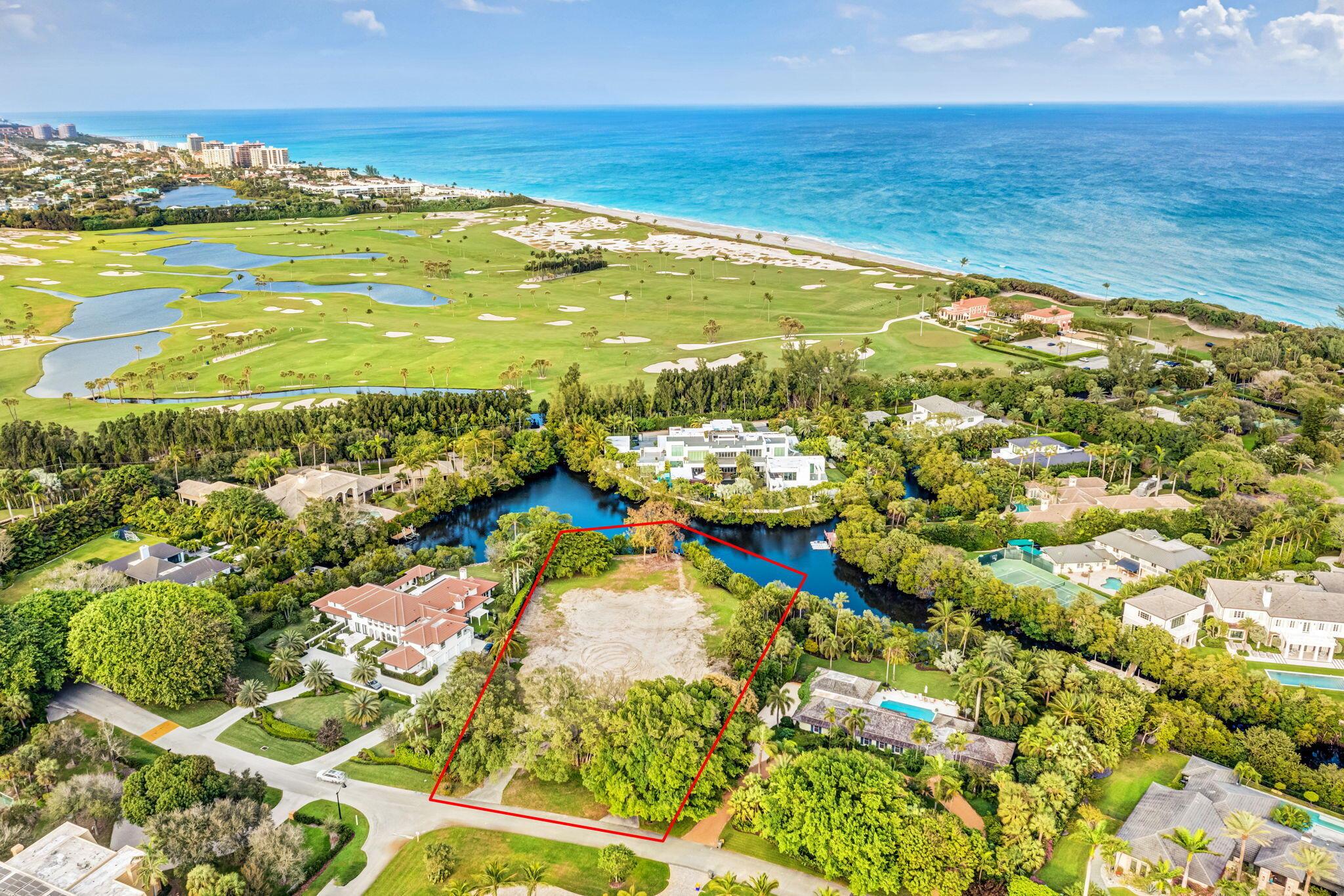 Incredibly RARE opportunity to build your DREAM HOME and reside in the exclusive community of Seminole Landing! Privately nestled on one of the most desirable and oversized lots (nearly 1.5 AC), this is your chance to live in paradise, with private beach access and steps from Seminole Golf Club! Fully Permitted and Approved Plans included in Listing price.**Red Lines on photos of property boundary are approximated based on county property website but not deemed to be exact. Please refer to Survey for Exact Boundary lines