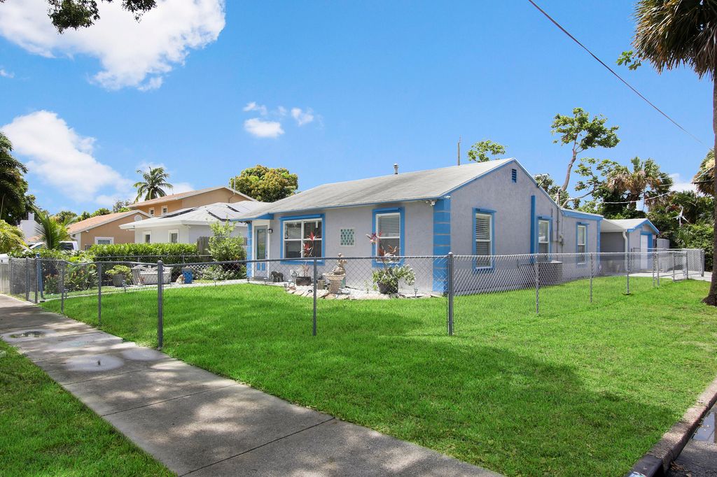 Photo of 701 55th Street St, West Palm Beach, FL 33407 (MLS # R10818042)