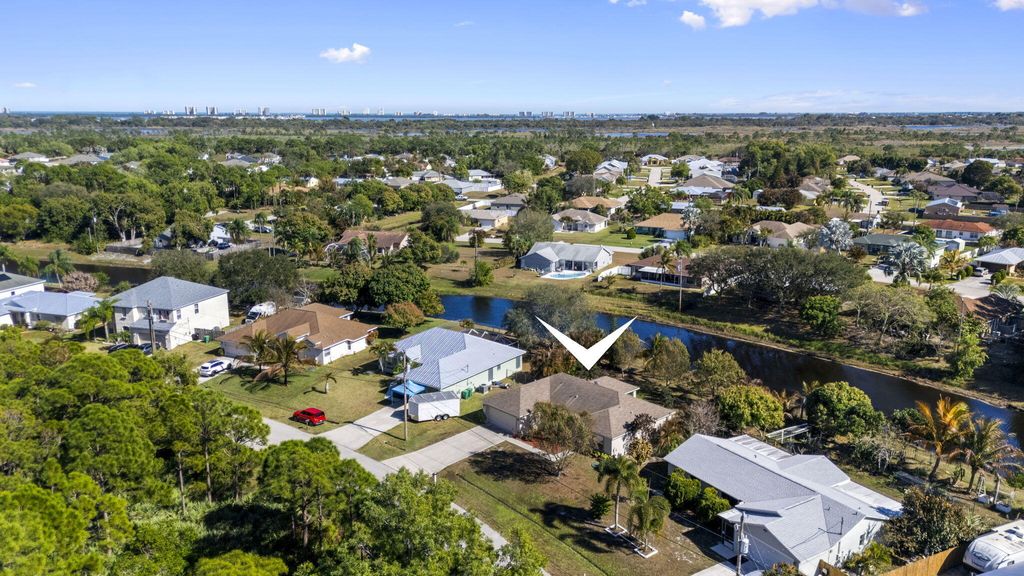 Photo of 2373 SE Rock Springs Drive, Port Saint Lucie, FL 34952 (MLS # R11160981)