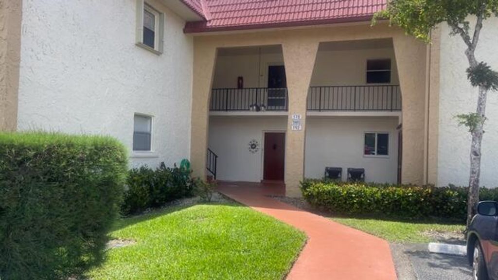 Photo of 180 Lake Evelyn Drive, West Palm Beach, FL 33411 (MLS # R10881896)